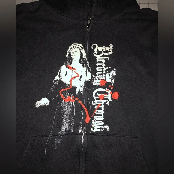 RARE. Bleeding Through (band). Size youth large . Black. Zipup jacket.